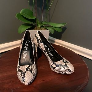 Calvin Klein Premda snake skin pump.
